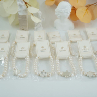 Pulseras  perlas  con osito Vie Or 12 uds - I33